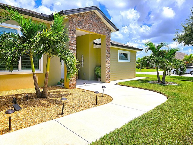 exterior space with a front lawn