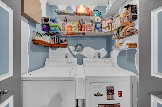 laundry room with separate washer and dryer