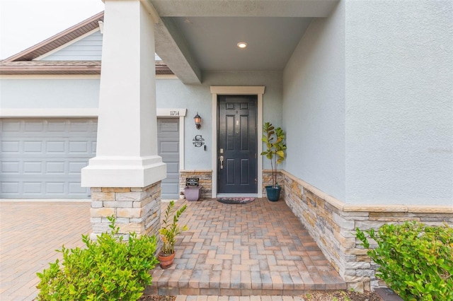 entrance to property with a garage