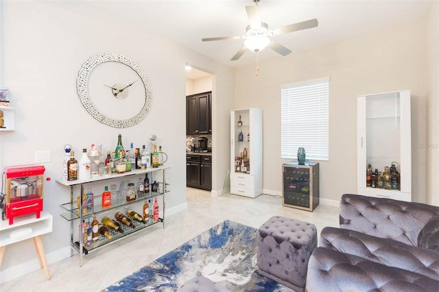 living room with indoor bar and ceiling fan