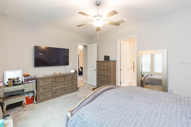 bedroom with light colored carpet and ceiling fan