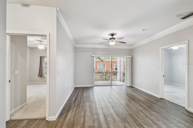 spare room with crown molding, ceiling fan, and hardwood / wood-style flooring