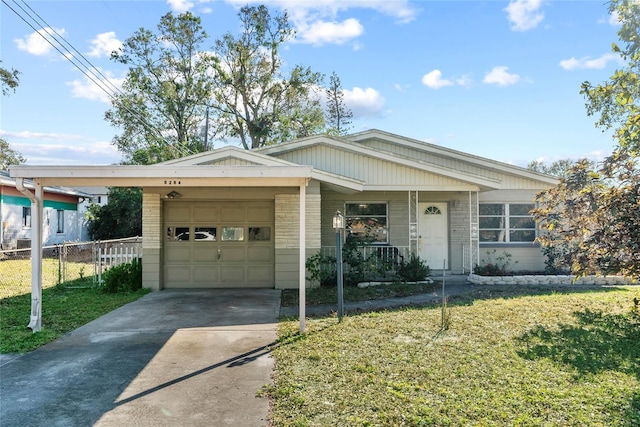 ranch-style home with a front yard, a carport, and covered porch