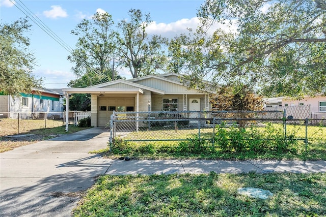 view of front of home featuring a carport and covered porch