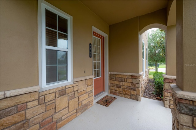 entrance to property with a porch