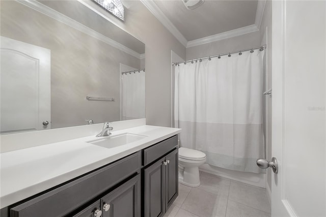 bathroom featuring tile patterned floors, toilet, vanity, and ornamental molding