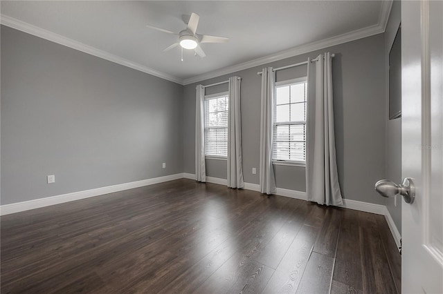 empty room with ceiling fan, dark hardwood / wood-style flooring, and crown molding