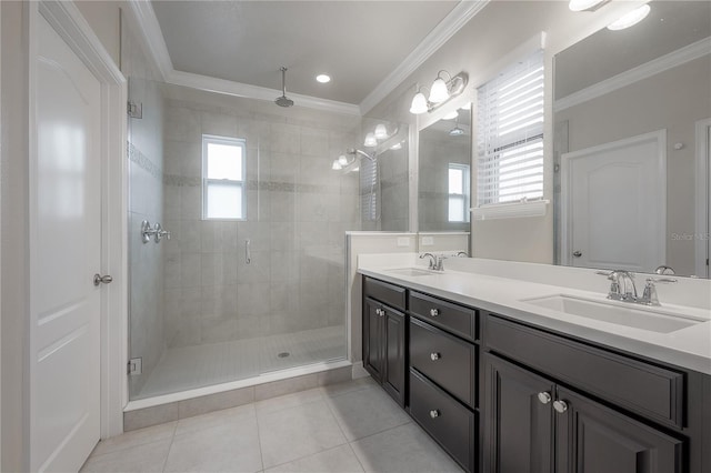 bathroom featuring vanity, tile patterned floors, a shower with shower door, and ornamental molding