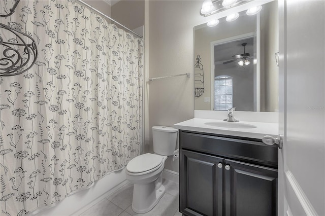 full bathroom with shower / bath combination with curtain, tile patterned floors, vanity, ceiling fan, and toilet