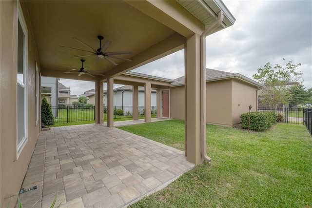 view of patio / terrace featuring ceiling fan