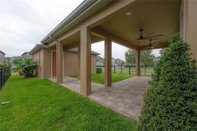 view of patio featuring ceiling fan