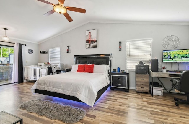 bedroom with access to outside, crown molding, light hardwood / wood-style flooring, vaulted ceiling, and ceiling fan