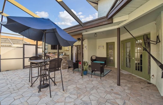 view of patio featuring french doors