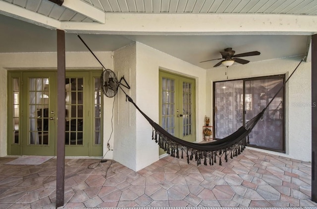 view of patio / terrace with french doors and ceiling fan