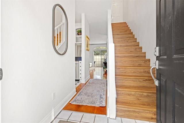 entrance foyer with light tile patterned floors