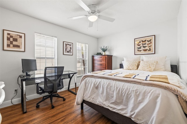 bedroom with ceiling fan and dark wood-type flooring