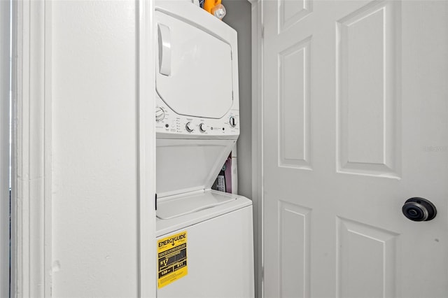 laundry room featuring stacked washing maching and dryer