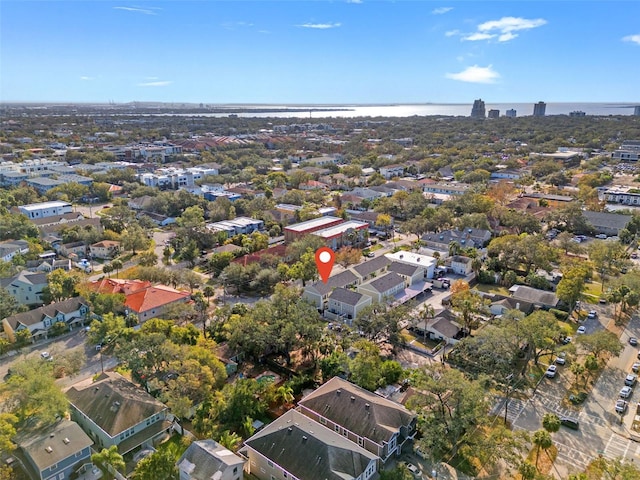 drone / aerial view with a water view