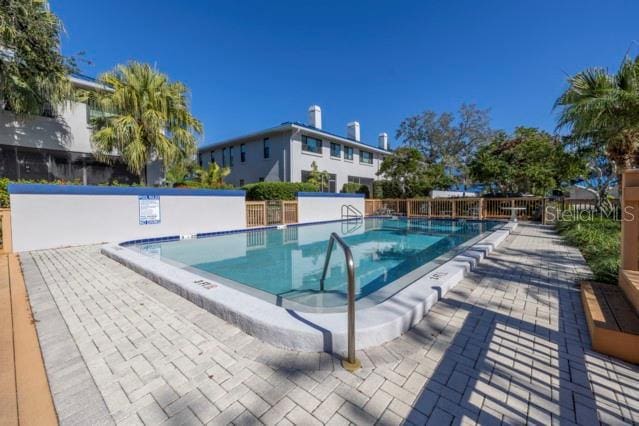 view of pool featuring a patio area