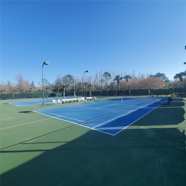 view of sport court featuring basketball court