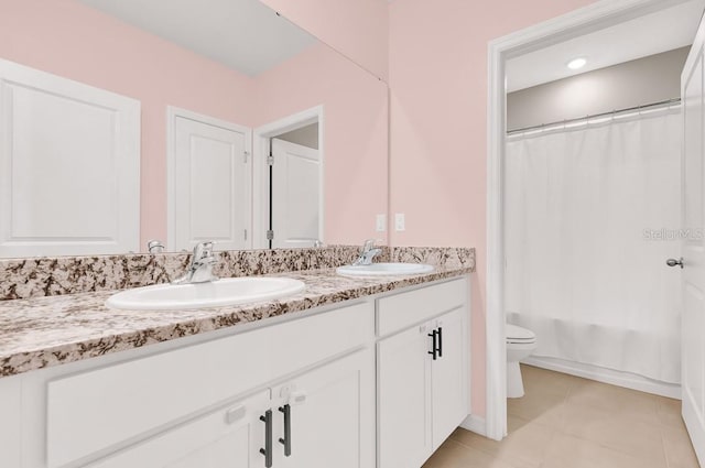 full bathroom with tile patterned flooring, vanity, toilet, and shower / bathtub combination with curtain