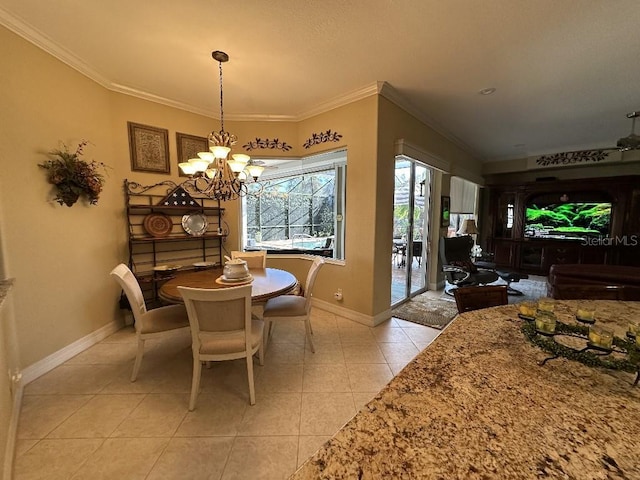 dining space with light tile patterned floors, ornamental molding, and an inviting chandelier