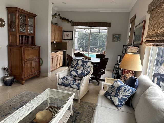 living room featuring light tile patterned flooring and crown molding