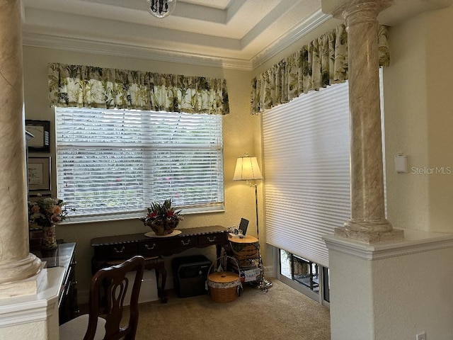 living area with carpet floors, decorative columns, and ornamental molding