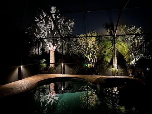 exterior space with an outdoor pool