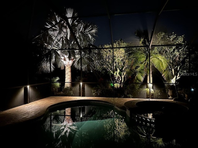 10626 Restoration Ter, Bradenton, FL 34212 - pool at twilight with a pool with connected hot tub