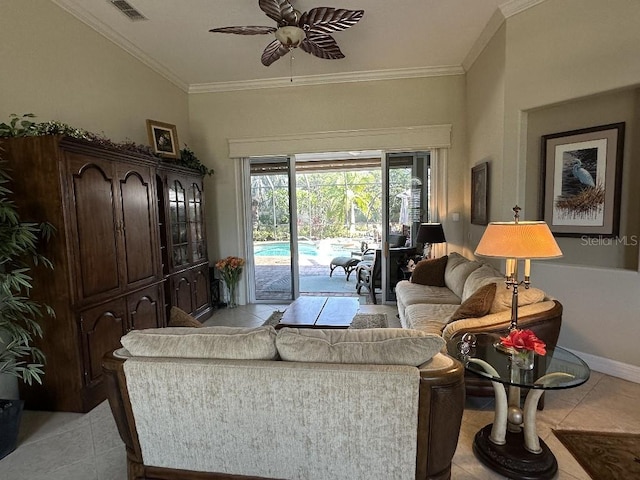 10626 Restoration Ter, Bradenton, FL 34212 - living area with ceiling fan, light tile patterned floors, ornamental molding, and baseboards