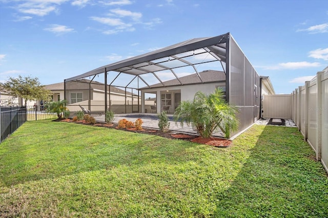 view of yard featuring glass enclosure