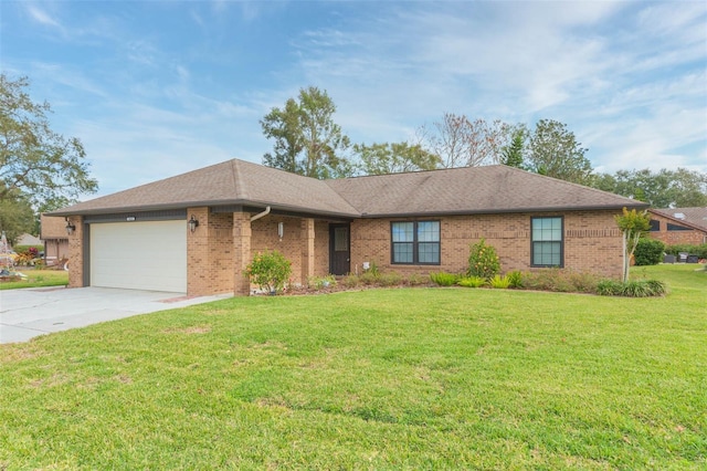 ranch-style home featuring a garage and a front yard