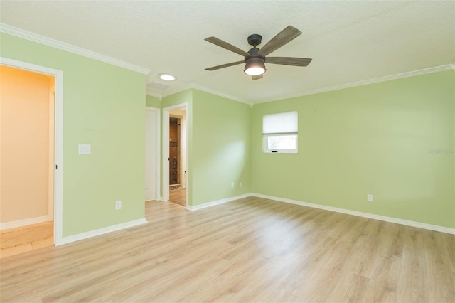 spare room with crown molding, light hardwood / wood-style flooring, ceiling fan, and a textured ceiling