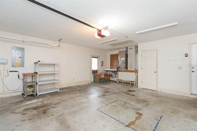 garage with electric panel, a garage door opener, and heating unit