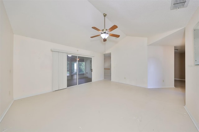 unfurnished room with a textured ceiling, vaulted ceiling, and ceiling fan