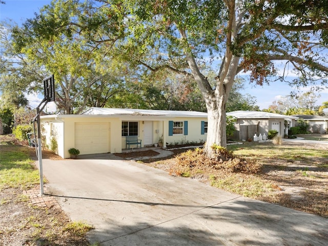 single story home with a garage