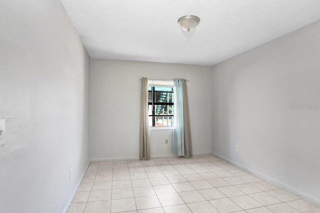 view of tiled spare room