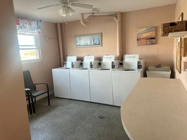 washroom with independent washer and dryer, ceiling fan, and sink