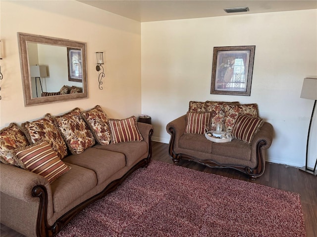 living room with dark wood-type flooring