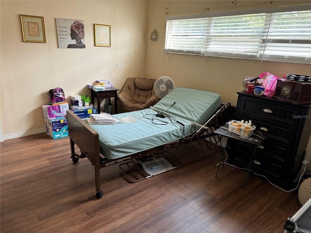 bedroom featuring hardwood / wood-style floors