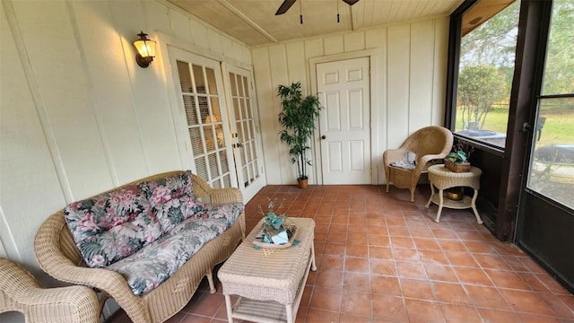 sunroom / solarium with ceiling fan