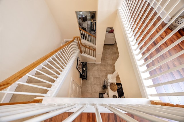 staircase with tile patterned flooring