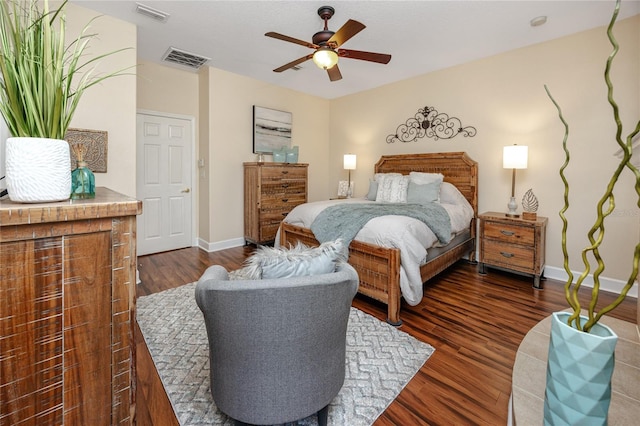 bedroom featuring ceiling fan and dark hardwood / wood-style flooring