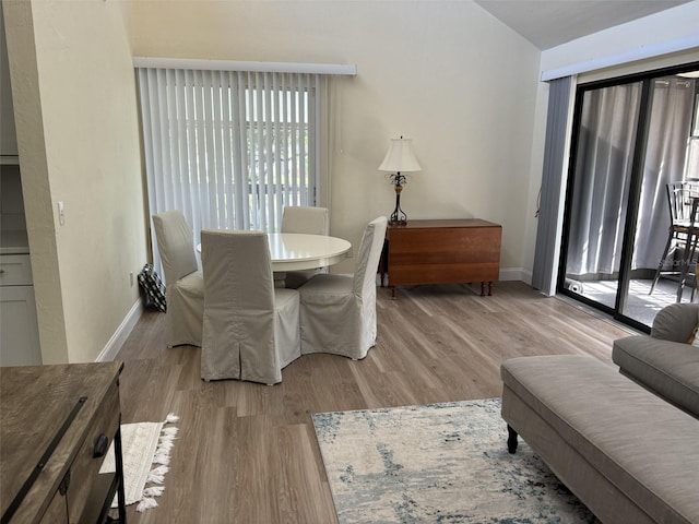 dining area with light wood-type flooring