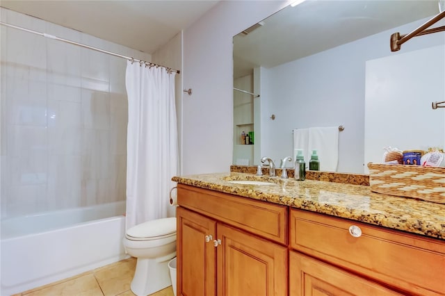 full bathroom with tile patterned flooring, shower / tub combo, vanity, and toilet