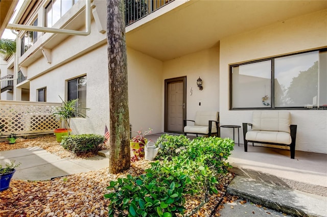 doorway to property featuring a balcony