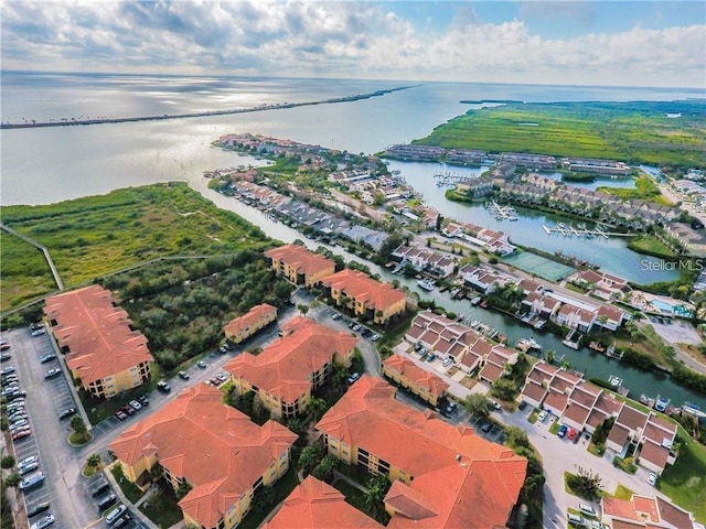 aerial view with a water view and a residential view