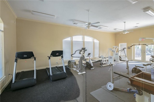 exercise room featuring ceiling fan, ornamental molding, and baseboards