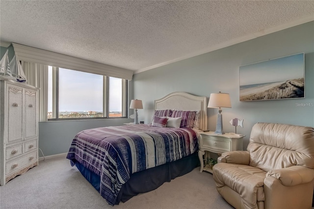 carpeted bedroom featuring a textured ceiling